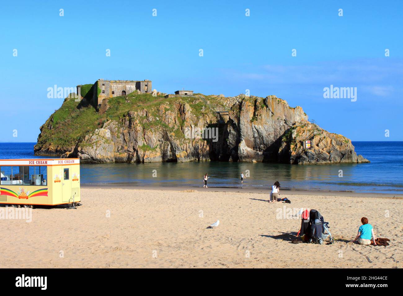 Beach at Tenby, with Saint Catherine's island and fortress. Stock Photo