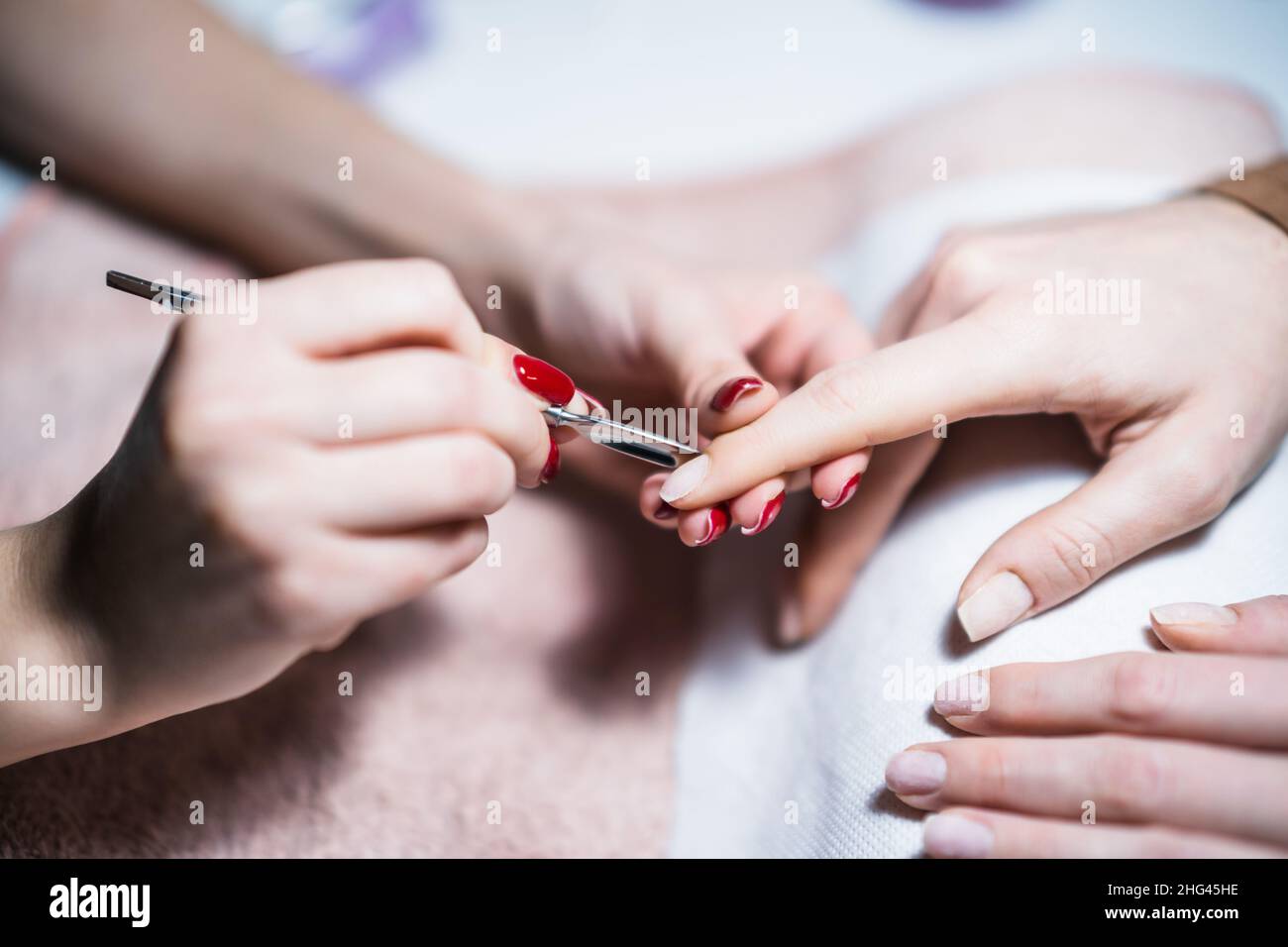 Close up image of manicure process, removal of excess skin on the nail with a special tool. Focus on fingernail Stock Photo - Alamy Close up image of manicure process, removal of excess skin on the nail with a special tool. Focus on fingernail Stock Photo - Alamy