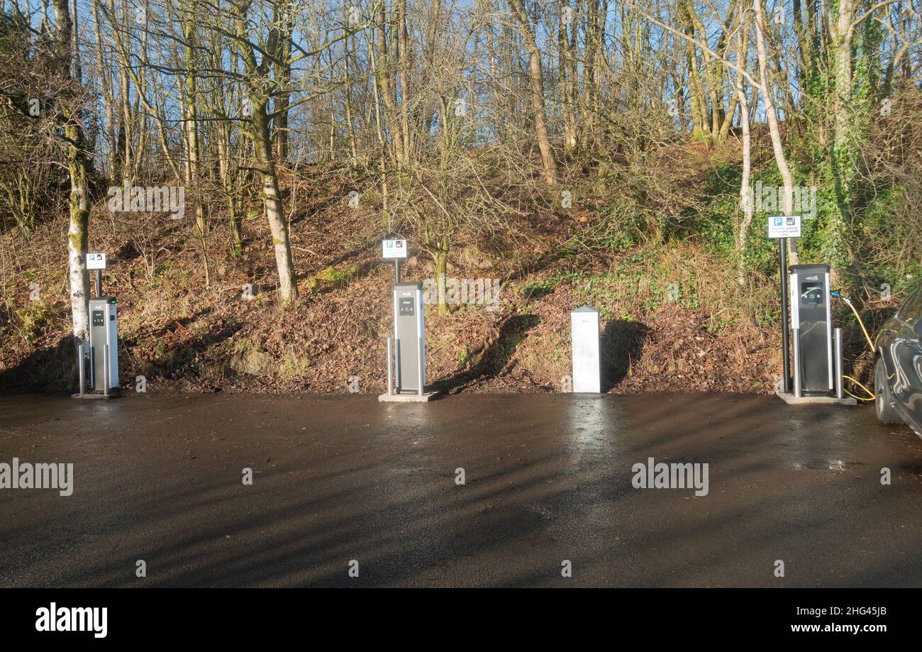 Three electric charging stations for cars in the car park of the