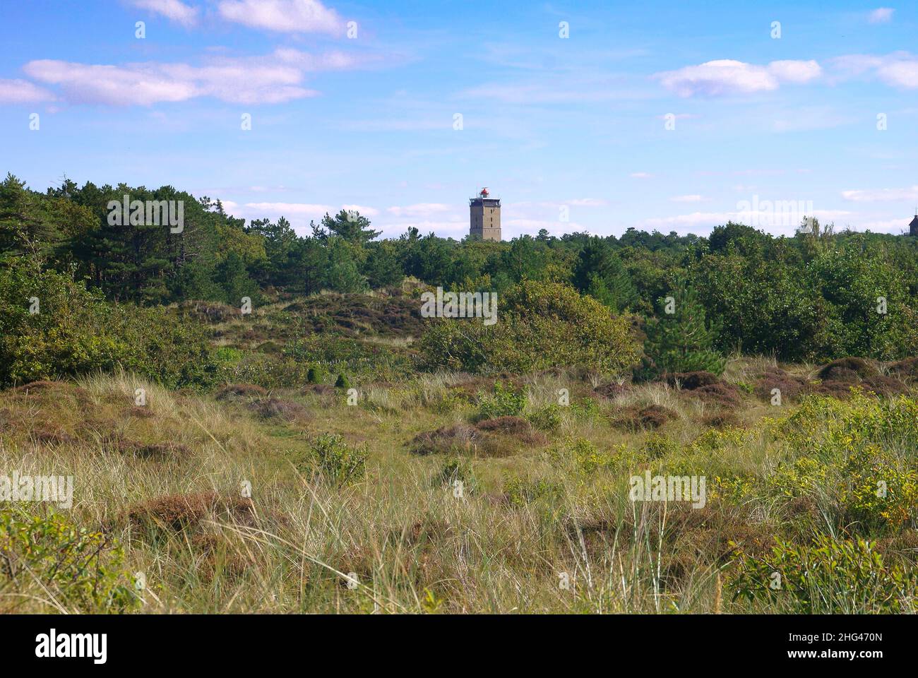 View over the Frisian island of Terschelling with Brandaris lighthouse potruding over the horizon. Stock Photo