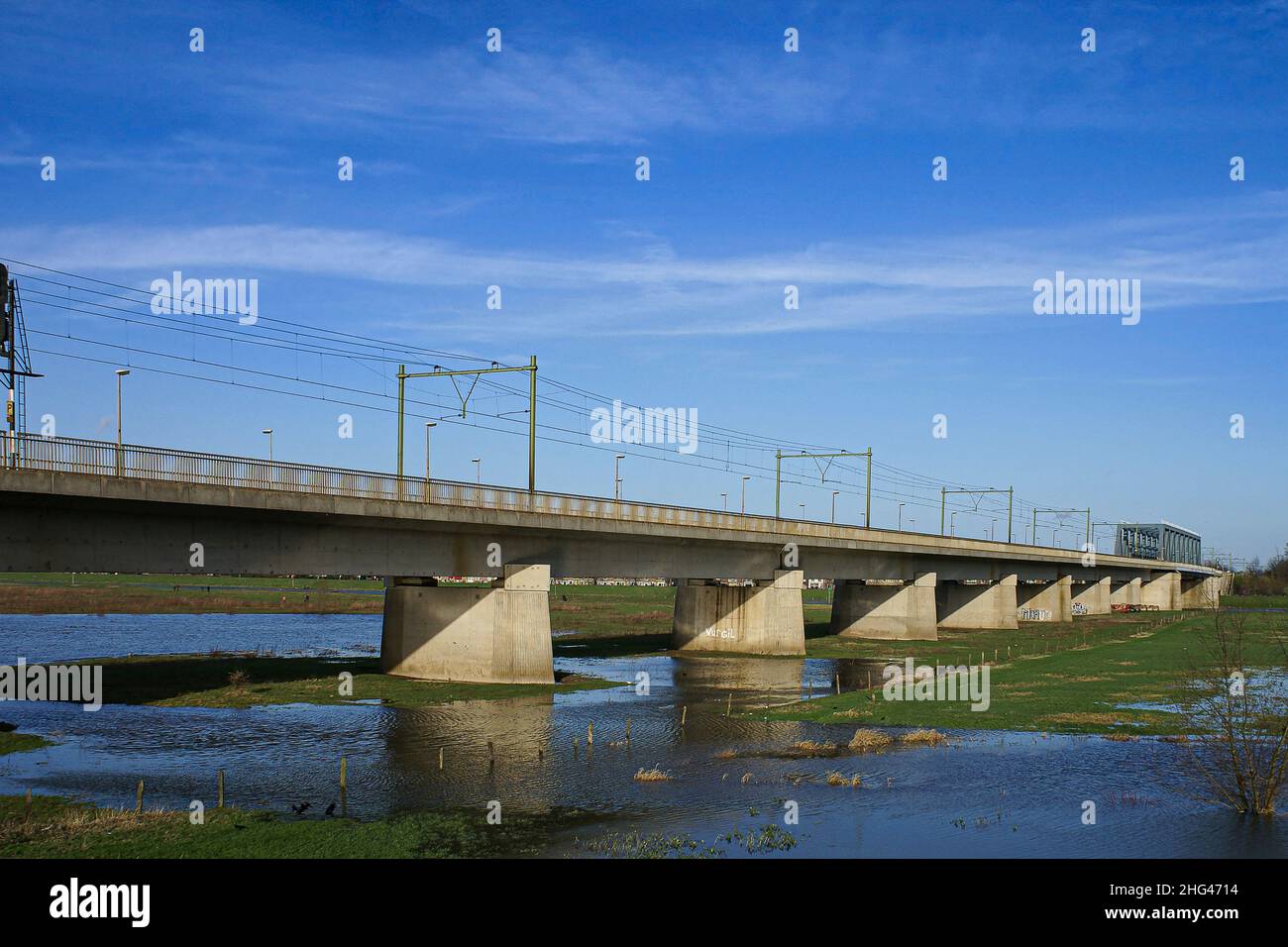 Railwaybridge over IJssel river near the city of Deventer Stock Photo