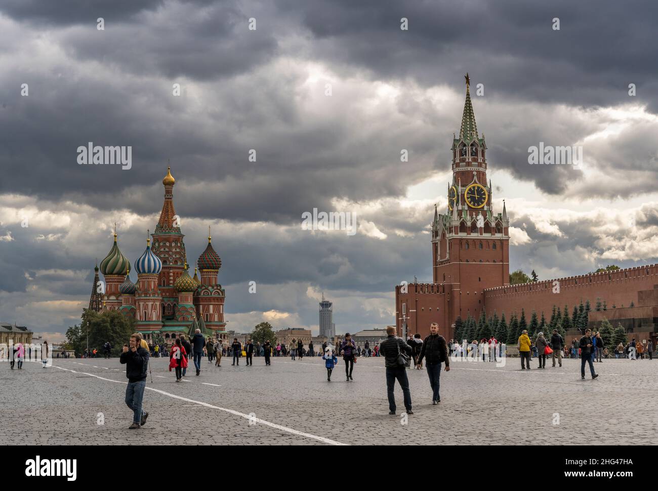 Moscow, Russia - September 25, 2019: Red sqaure with people and National Historic Museum and Lenin Mausoleum on an dark autumn day. Stock Photo