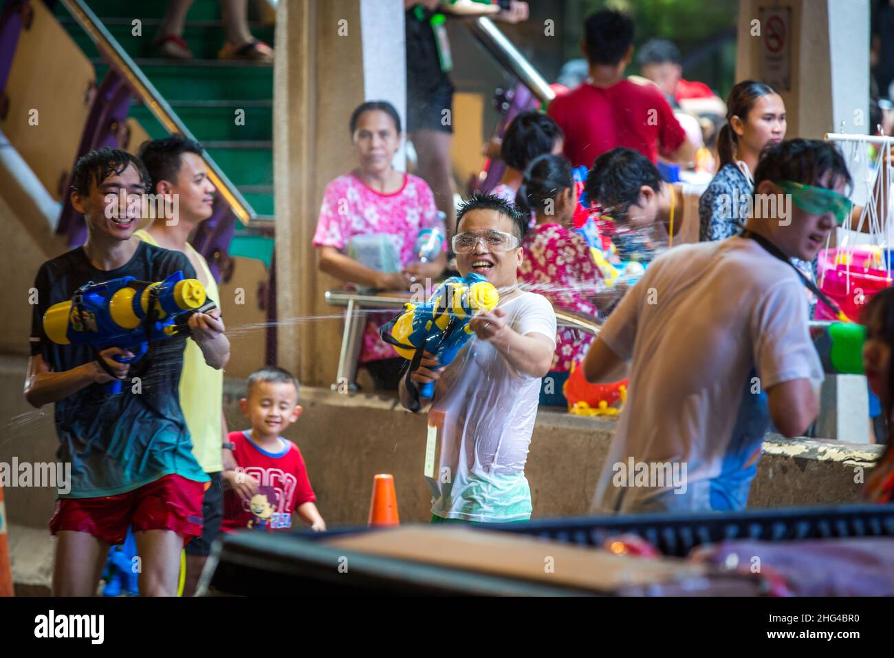 BANGKOK, THAILAND - APRIL 13, 2018: People on the streets of Bangkok celebrating first day of Songkran Festival, Thai New Year celebrations. Stock Photo