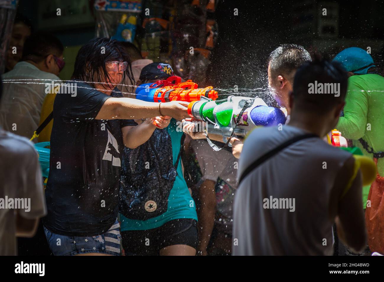 BANGKOK, THAILAND - APRIL 13, 2018: People on the streets of Bangkok celebrating first day of Songkran Festival, Thai New Year celebrations. Stock Photo