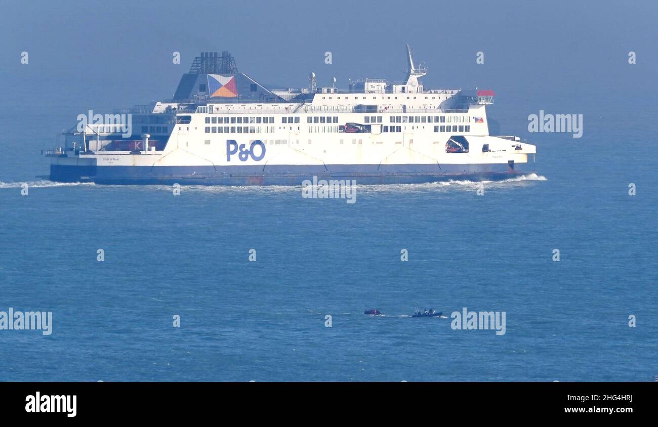 A small boat carrying people thought to be migrants is intercepted by ...