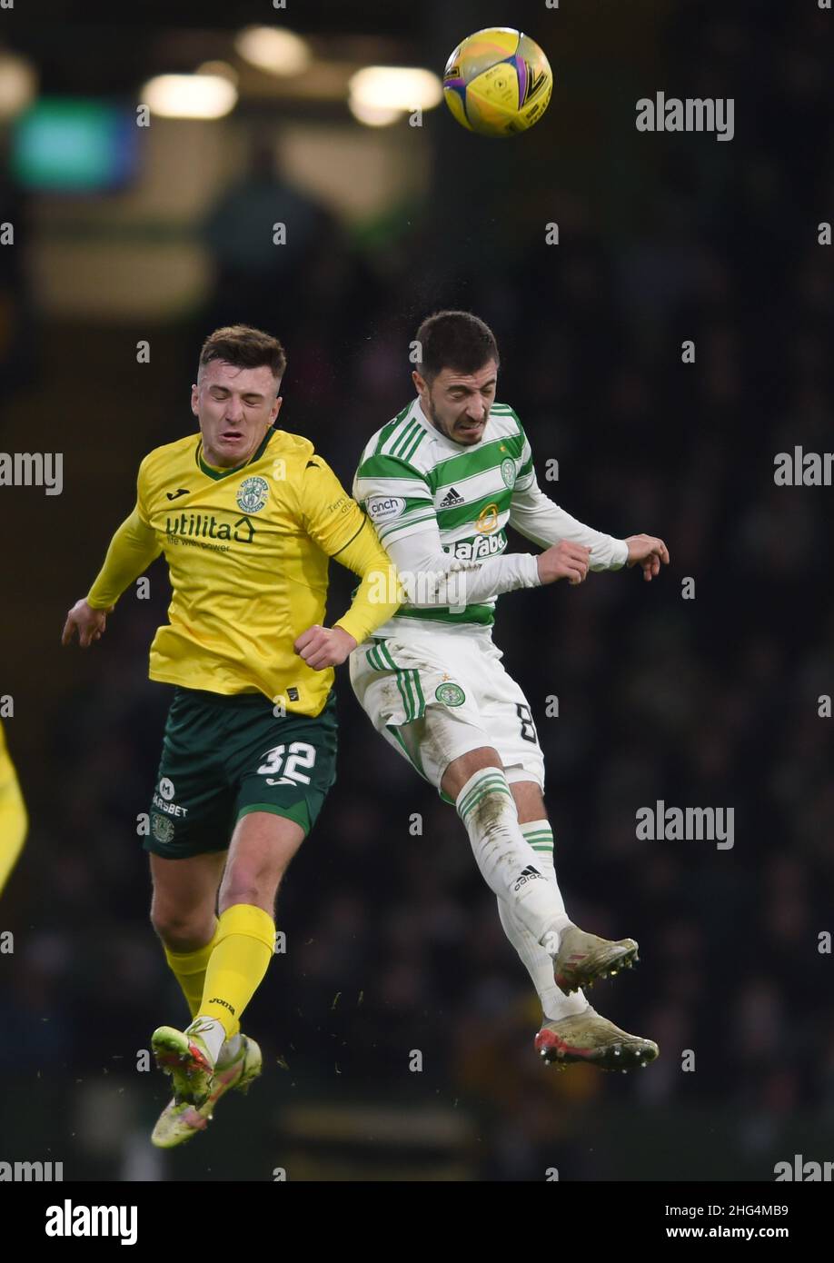 Glasgow, Scotland, 17th January 2022.  Josh Campbell of Hibernian and Josip Juranovic of Celtic  during the Scottish Premier League match at Celtic Park, Glasgow. Picture credit should read: Neil Hanna / Sportimage Stock Photo