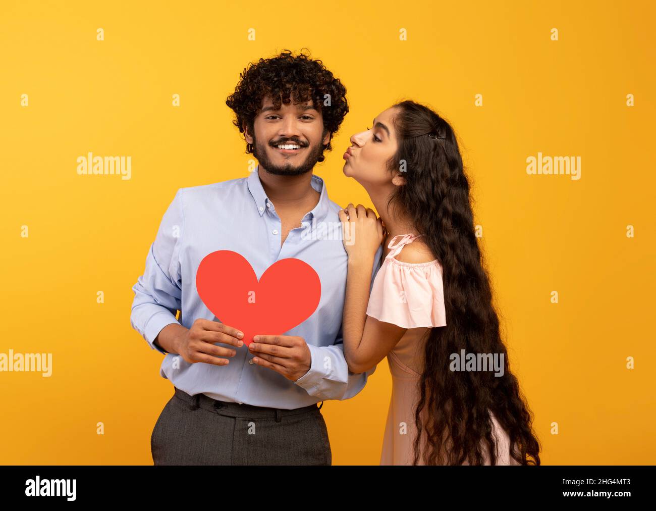 Young indian couple kissing hi-res stock photography and images - Alamy