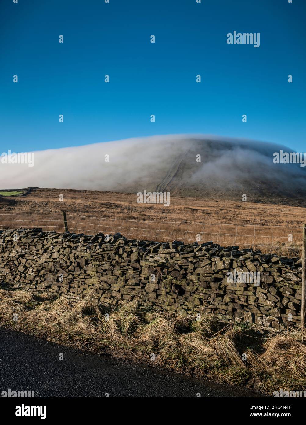 Cloud inversion over Pendle HIll, Lancashire, UK. Stock Photo
