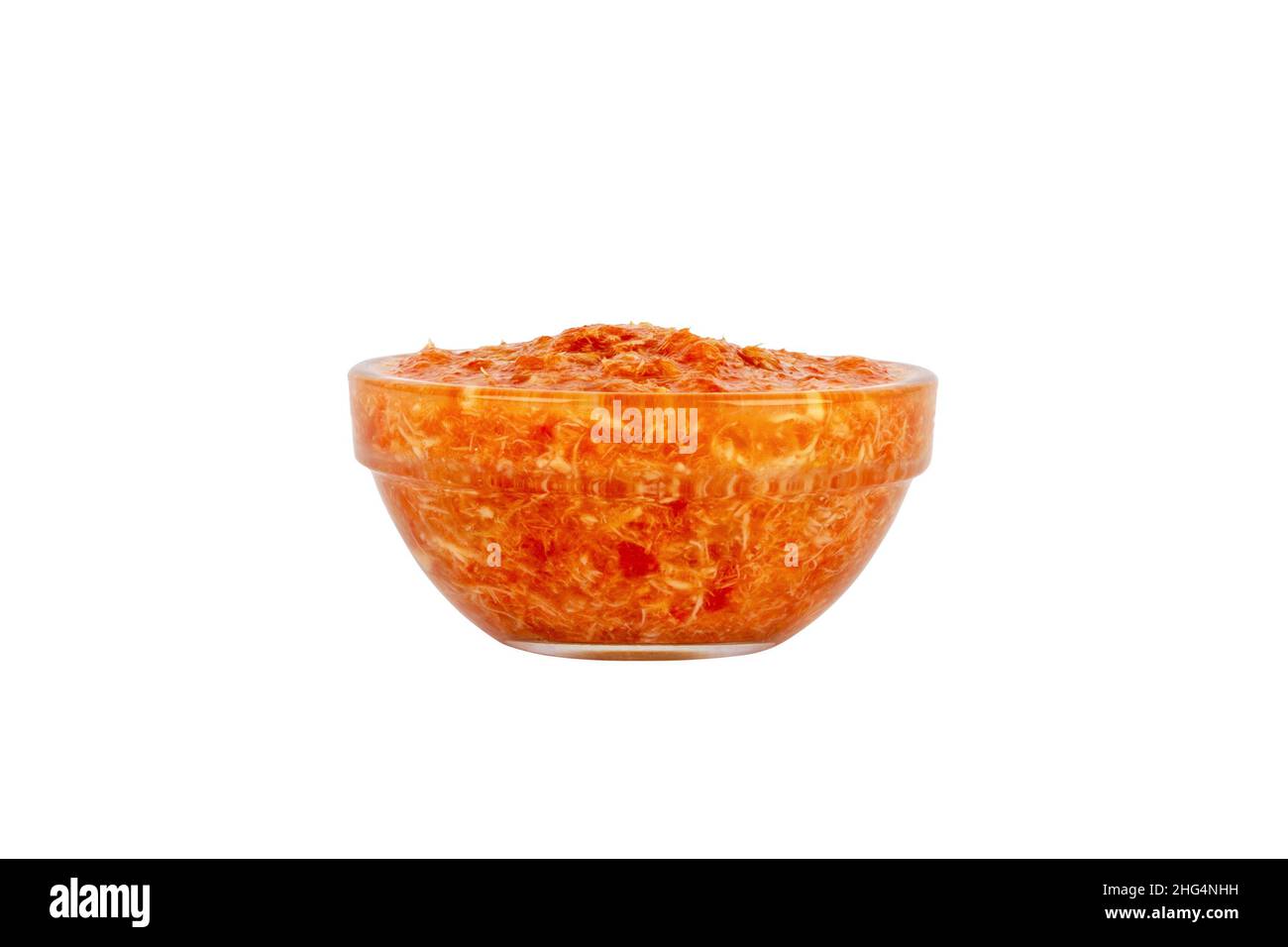 horseradish root seasoning in tomato sauce in a glass bowl isolated on