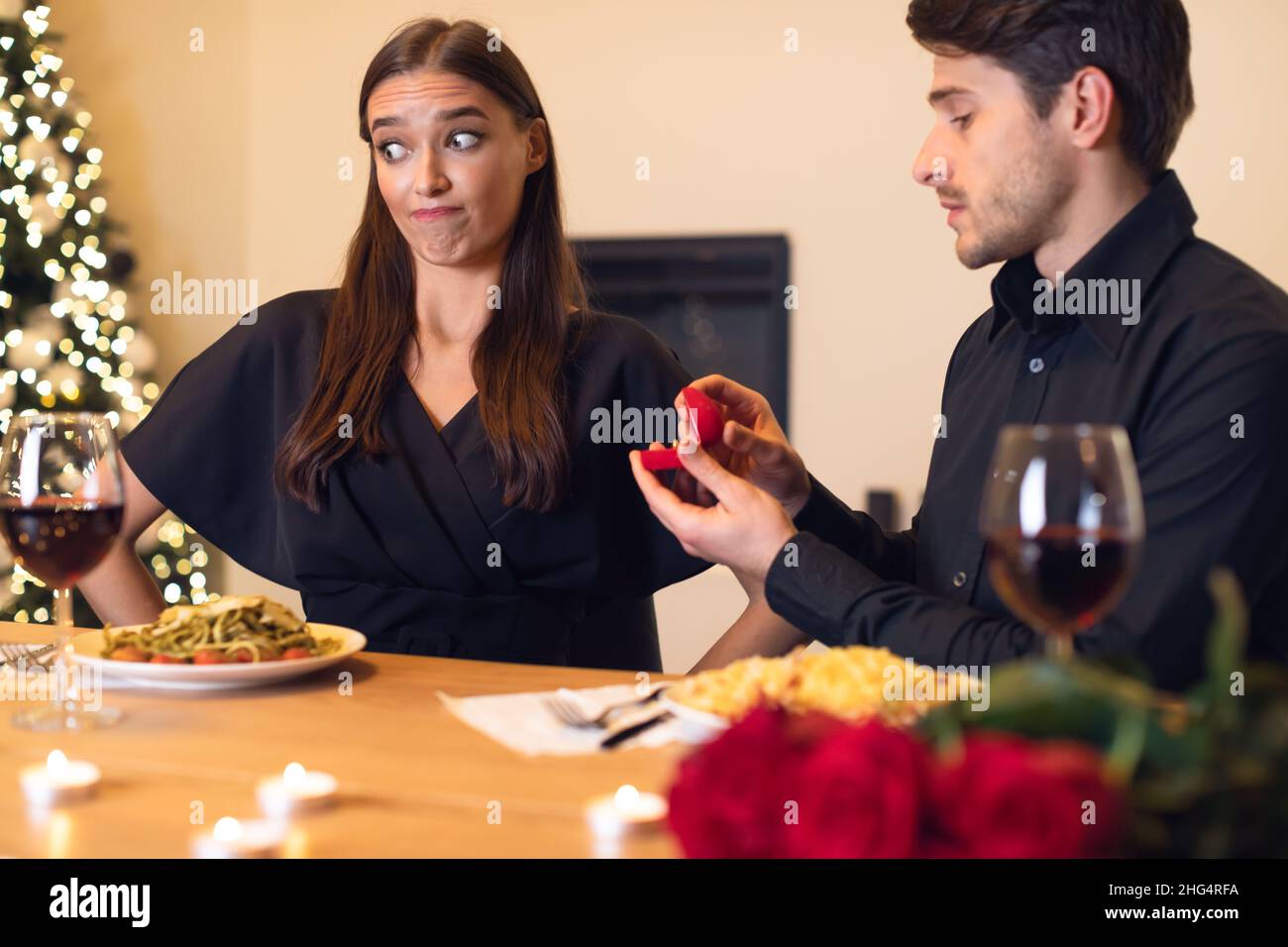Man making proposal with ring, woman rejecting Stock Photo