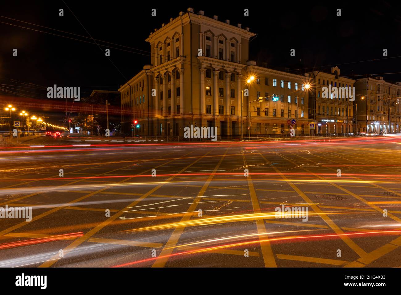 Kazan, Russia - September 21, 2019: Pushkin Street at night with many car lights and stripes in red and yellow, Tartastan, Russia. Stock Photo