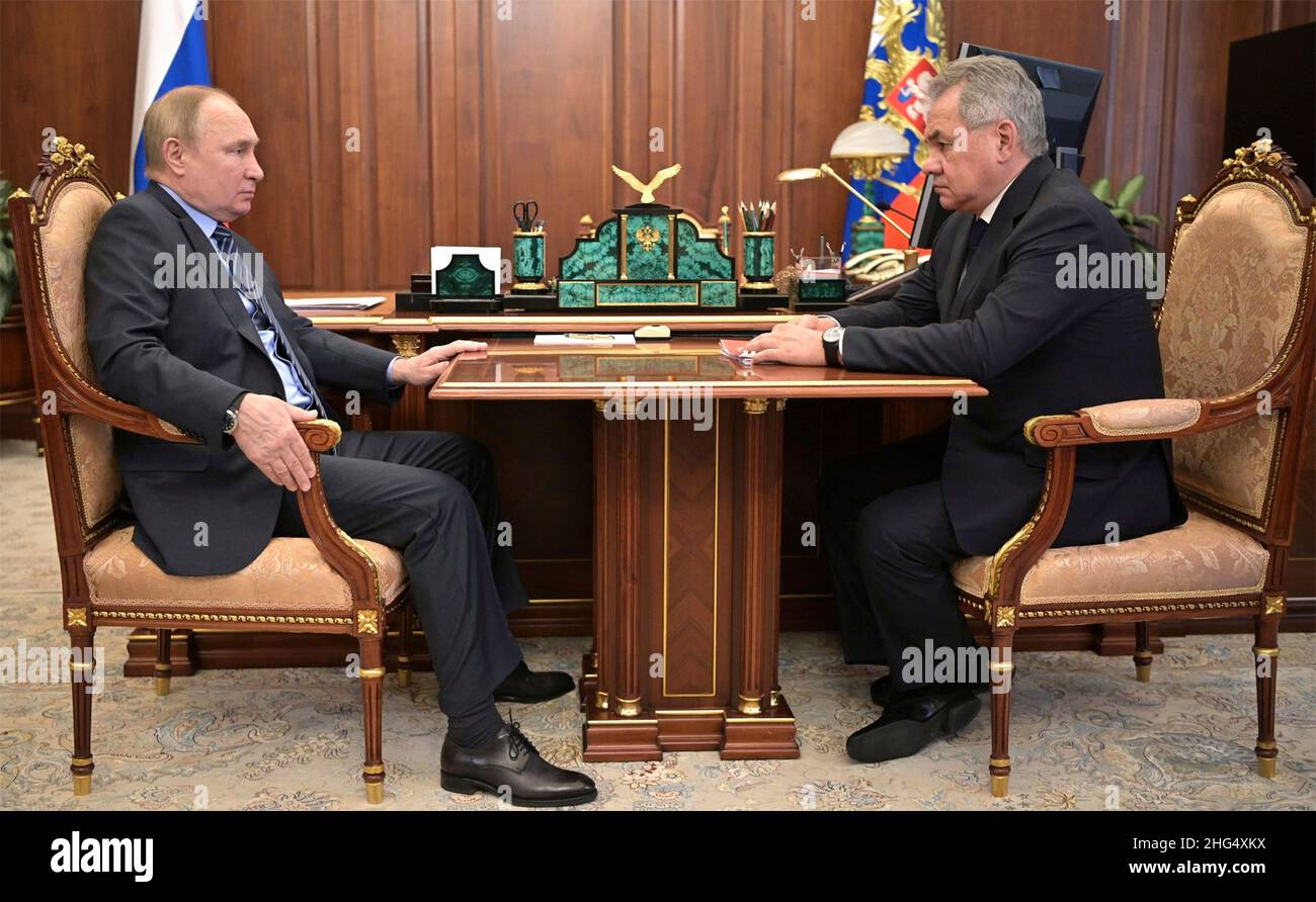 Moscow, Russia. 13 January, 2022. Russian President Vladimir Putin holds a face-to-face meeting with Defence Minister Sergei Shoigu, right, at the his Kremlin office, January 13, 2022 in Moscow, Russia. Credit: Alexei Nikolsky/Kremlin Pool/Alamy Live News Stock Photo