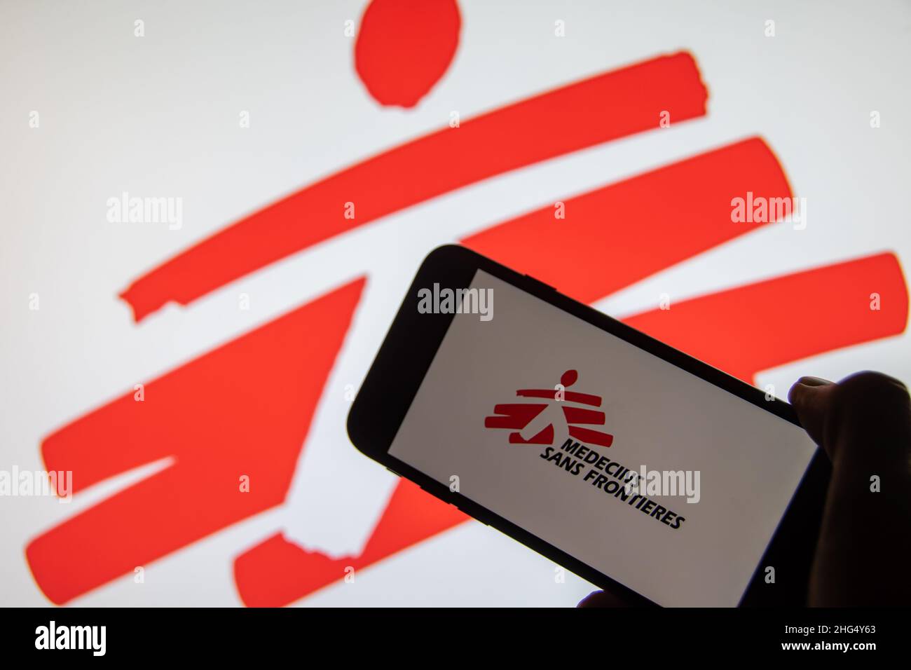 Rheinbach, Germany  15 January 2022,  The brand logo of 'Medecins Sans Frontieres' on the display of a smartphone (focus on brand logo) Stock Photo