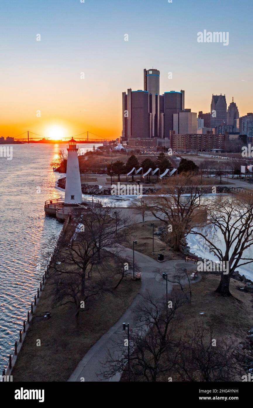 Detroit, Michigan - Downtown Detroit and the Detroit River as the sun ...