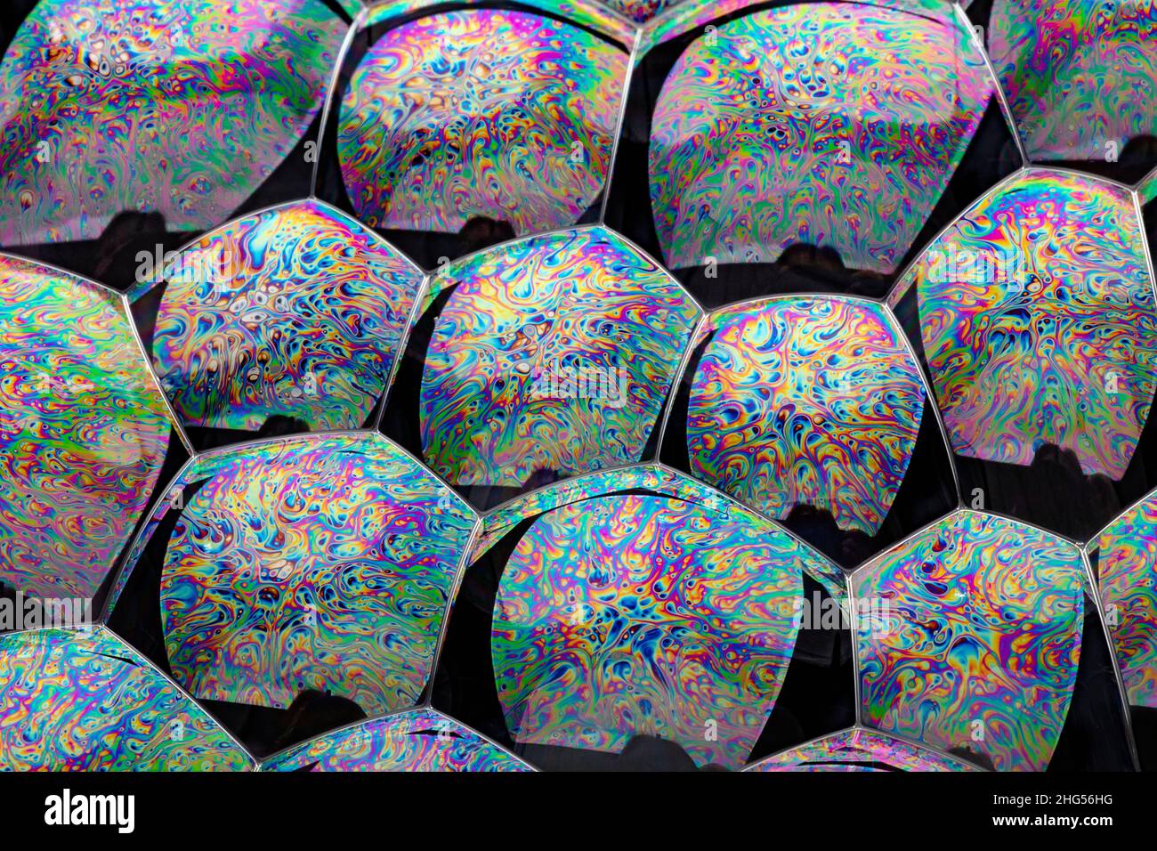 Light Refracting on Bubble Film Surface Stock Photo