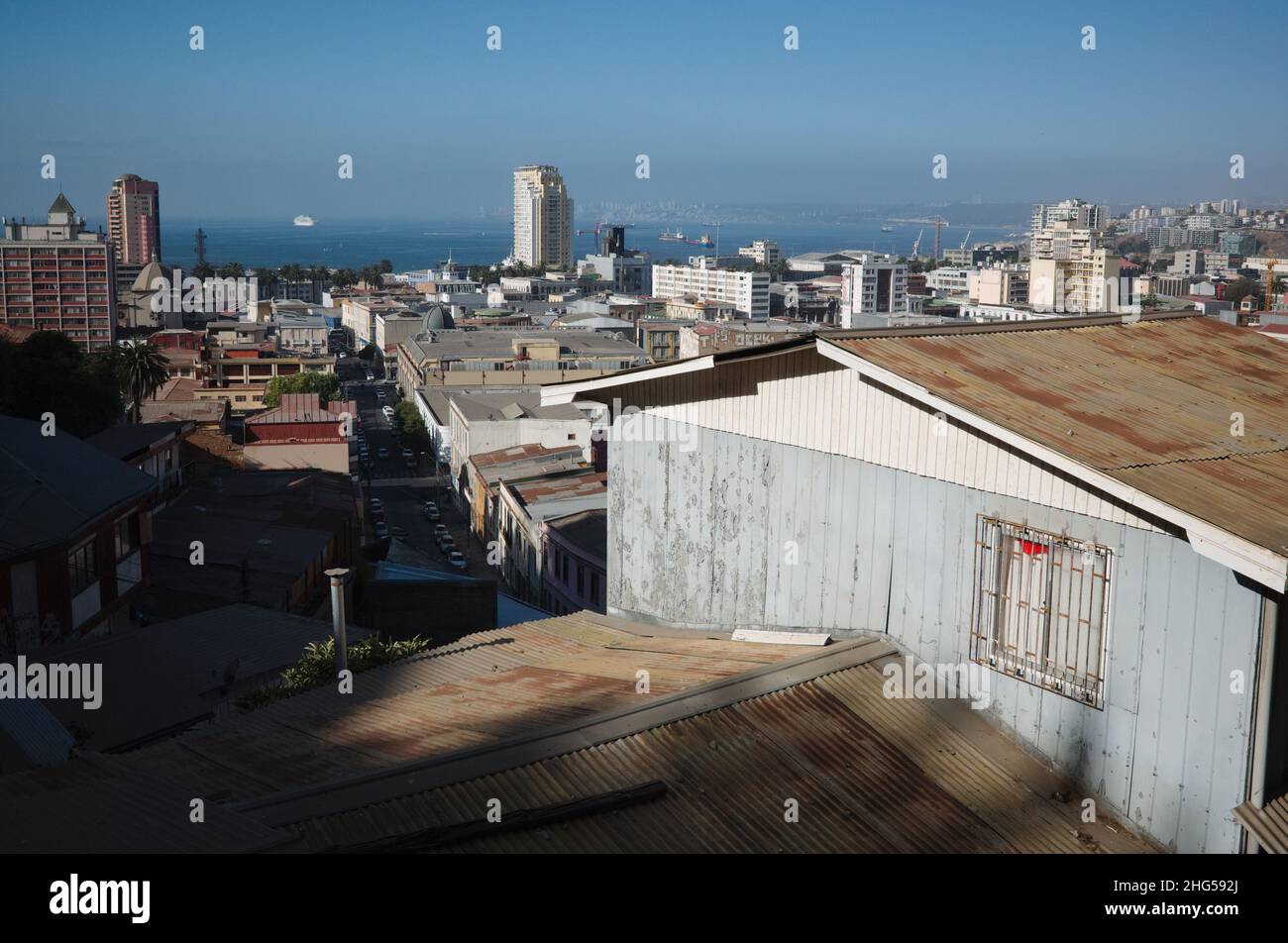 Valparaiso, Chile - February, 2020: Panoramic view of Valparaiso city. View from hill to Carrera street and Caleta Grande bay Stock Photo