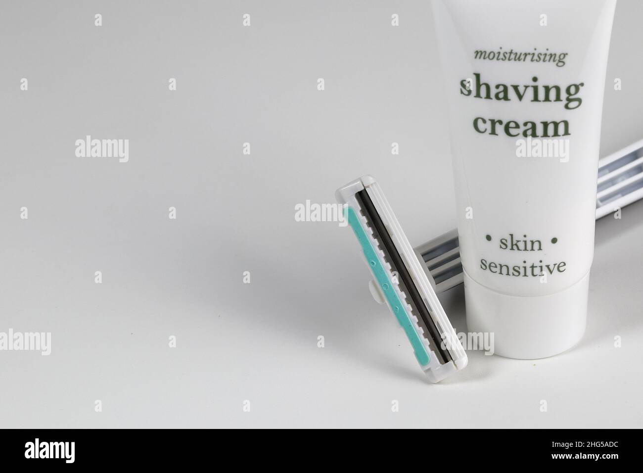 Razor and shaving cream, Disposable shaver and shaving cream isolated