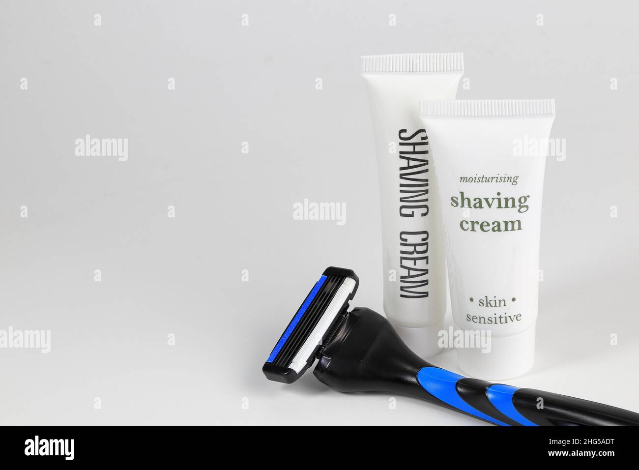 Razor and shaving cream, Disposable shaver and shaving cream isolated