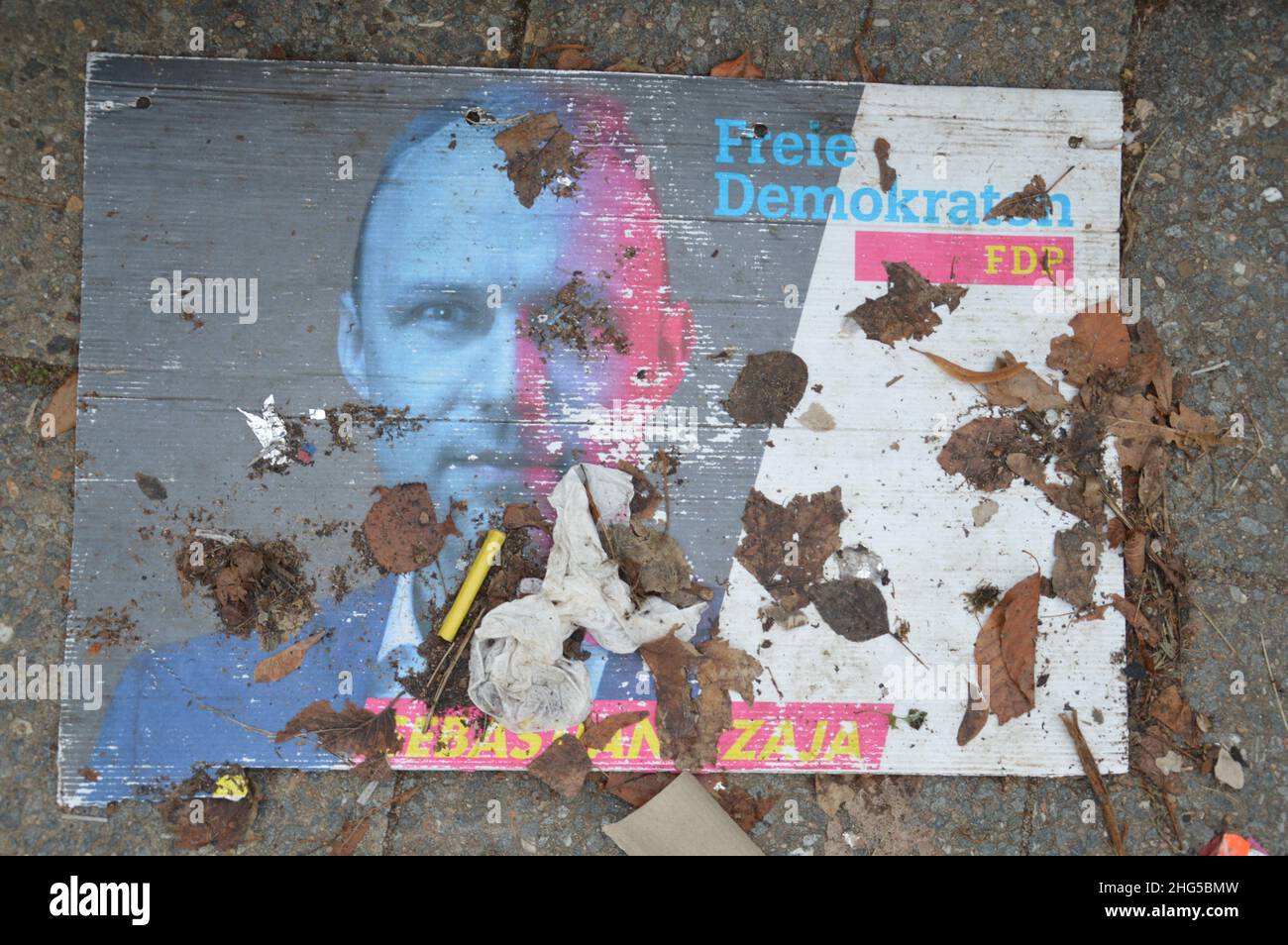 Abondoned election poster of Sebastian Czaja (FDP) near the Glienicke Bridge in Wannsee, Berlin, Germany - January 9, 2022. Stock Photo