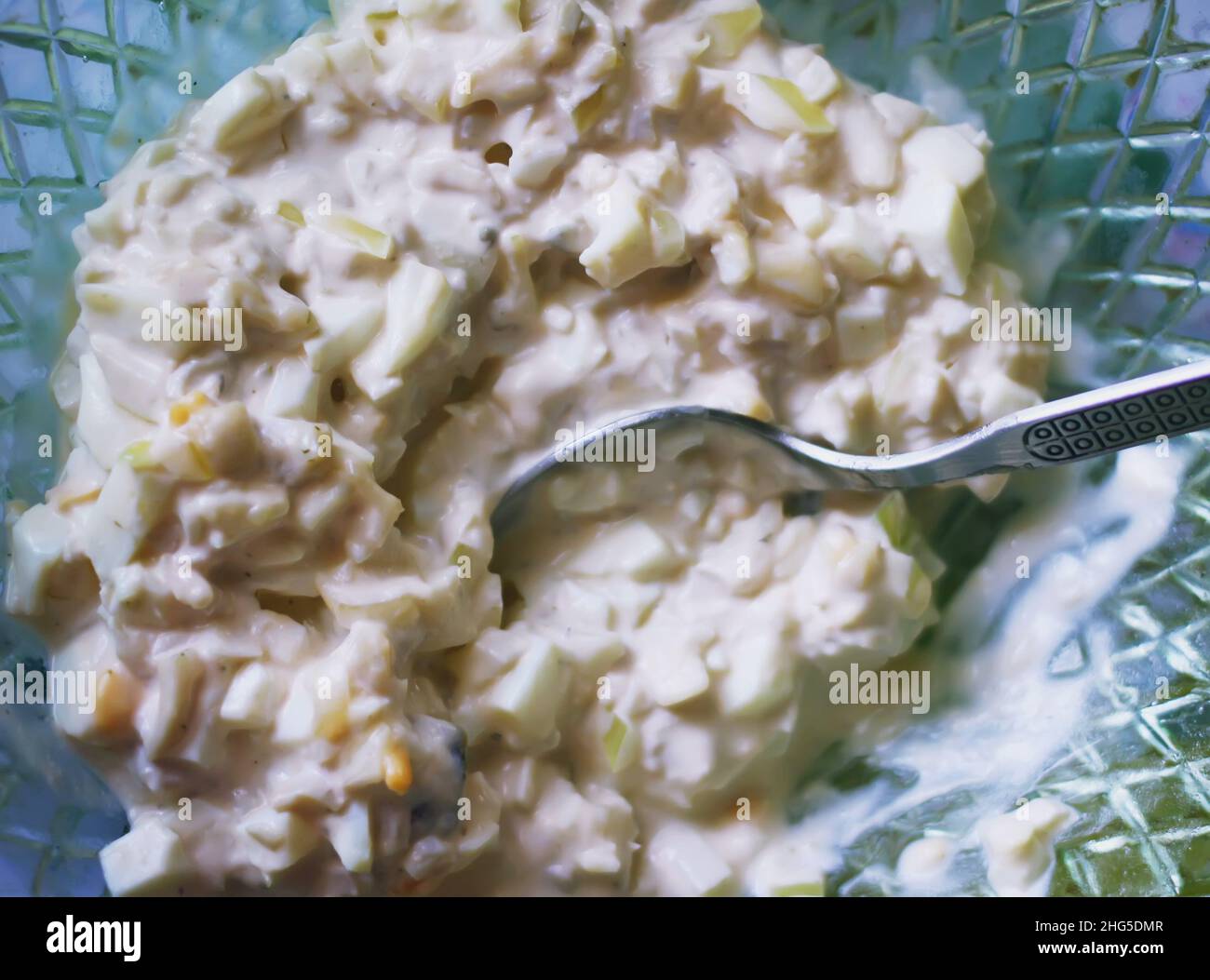 Squid salad with onions and mayonnaise in russian style Stock Photo Alamy