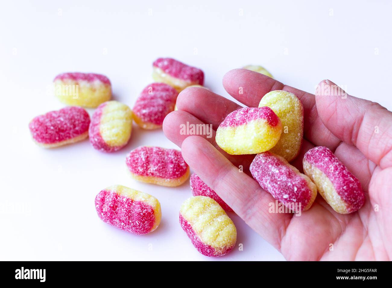 Rhubarb and custard hard boiled sweets Stock Photo