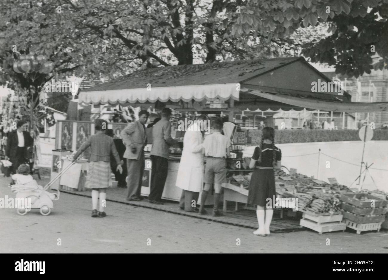 Antique circa 1950 photograph, a market stand near shore in Lucerne, Switzerland. SOURCE: ORIGINAL PHOTOGRAPH Stock Photo