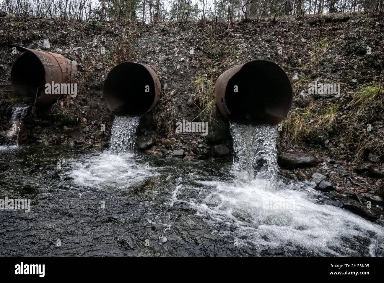 Gutter. Water runoff from a road spillway (water disposal, storm drain