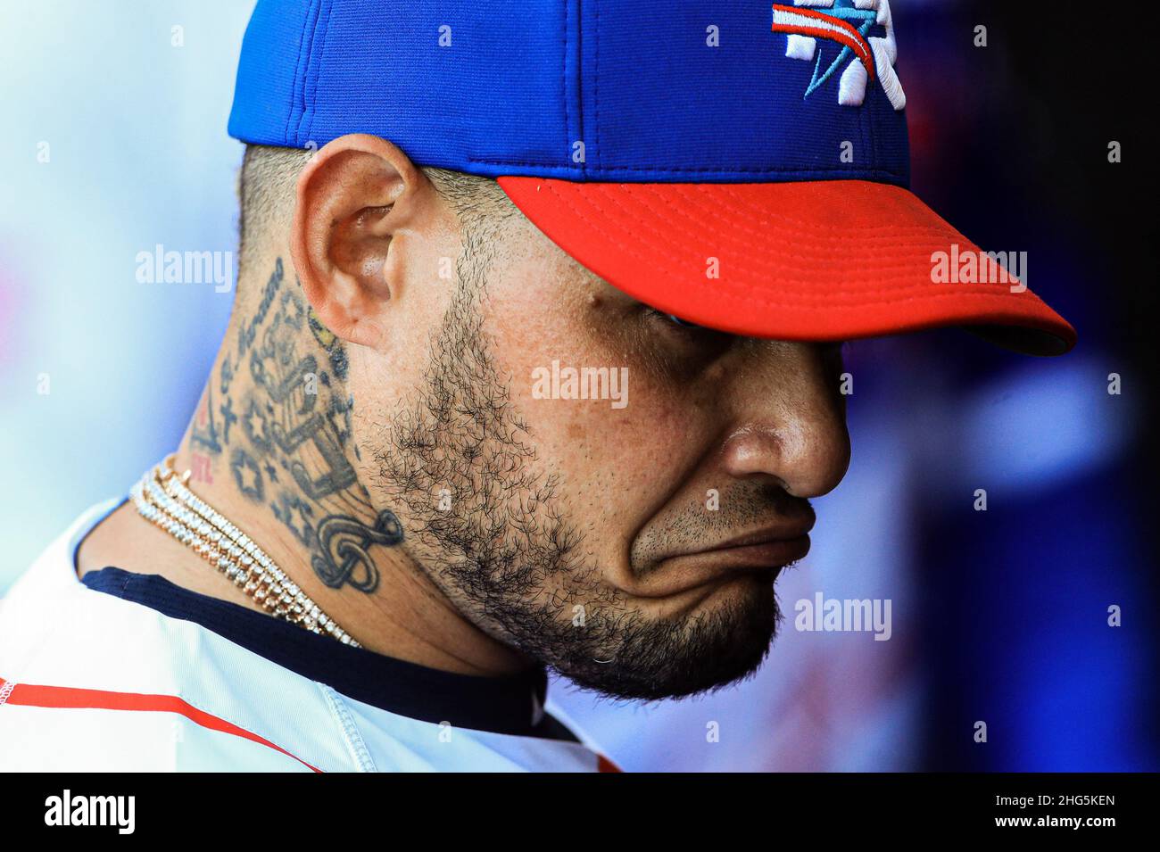 MAZATLAN, MEXICO - FEBRUARY 03: Yadier Molina of Los Criollos de Caguas,neck  tattoo, neck tattoo, music sign, tatuaje en el cuello, signo de música ,  during the game between Colombia and Puerto