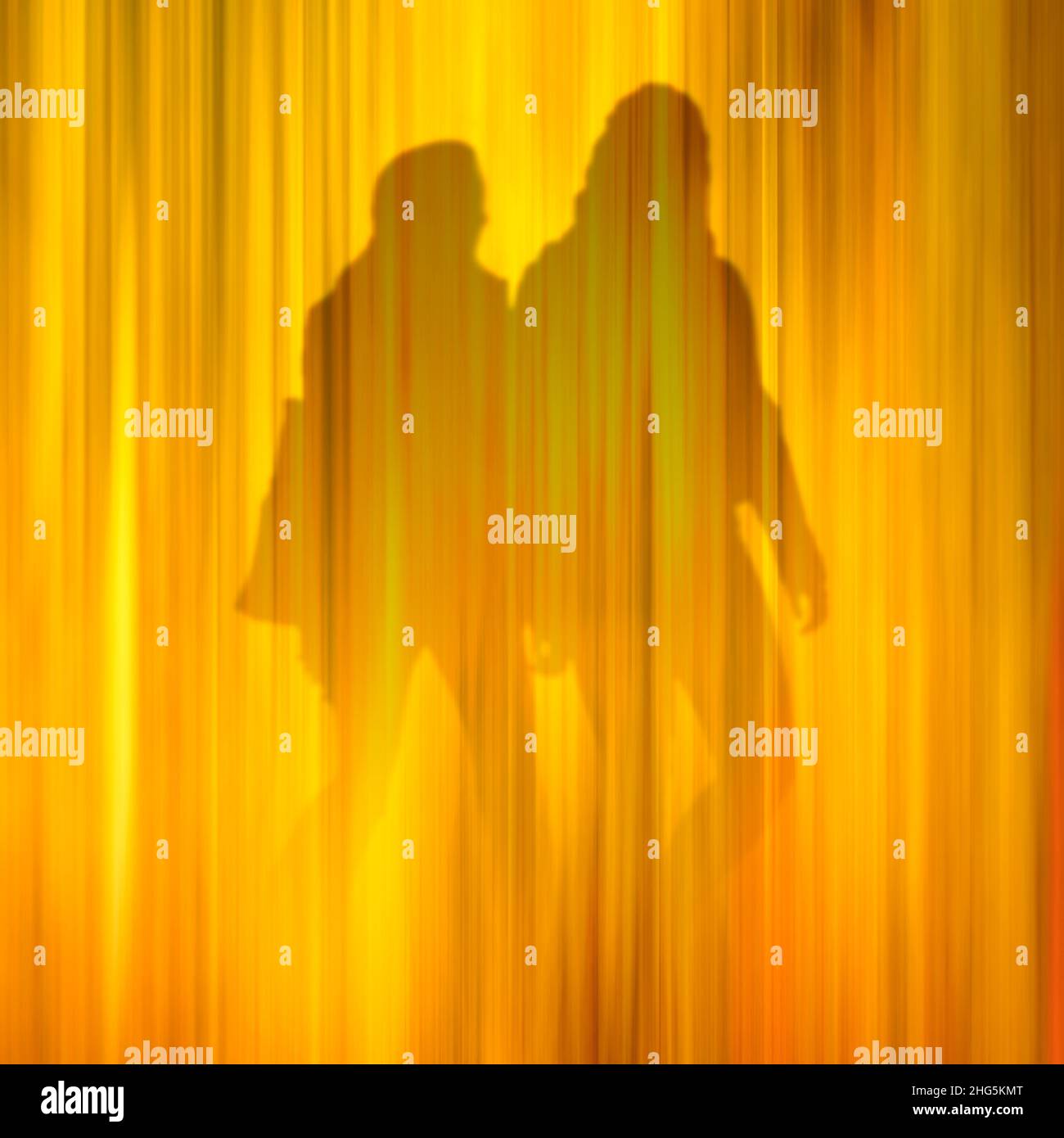 Conceptual image of two people walking. Their identity, gender and relationship is ambiguous. Stock Photo