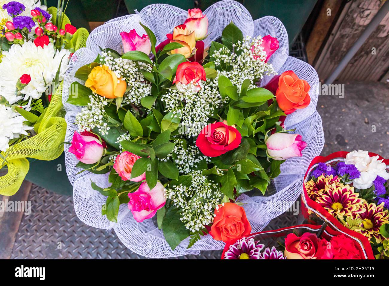 Brighton Beach, Brooklyn, New York City, New York, USA. Flowers for sale outside a deli in New