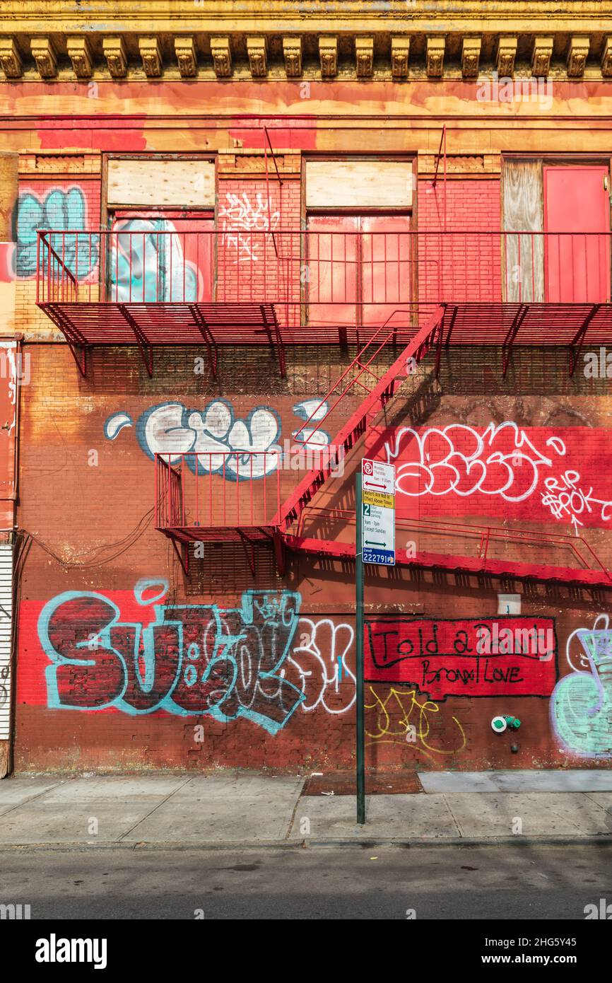 The Bronx, New York City, New York, USA. November 2, 2021. Graffiti on a  boarded up building in The Bronx Stock Photo - Alamy
