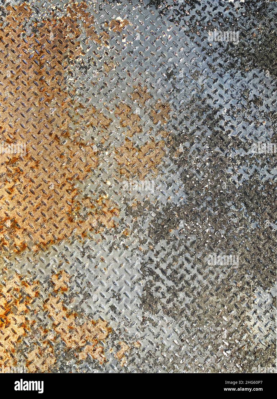 An old, rusty, peeling diamond plate floor texture Stock Photo