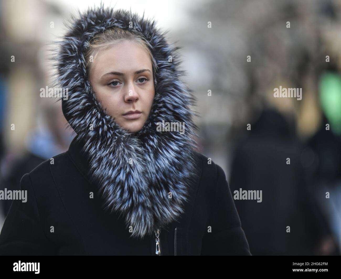 Young girl in winter clothes, Knez Mihailova street. Belgrade, Serbia Stock Photo