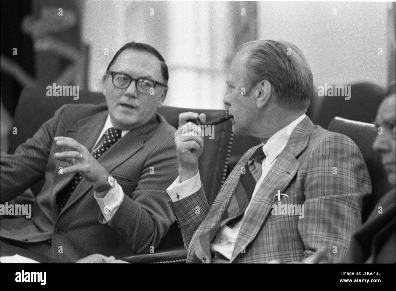 Senator Robert P. Griffin of Michigan and President Gerald R. Ford at a Transition Team Meeting