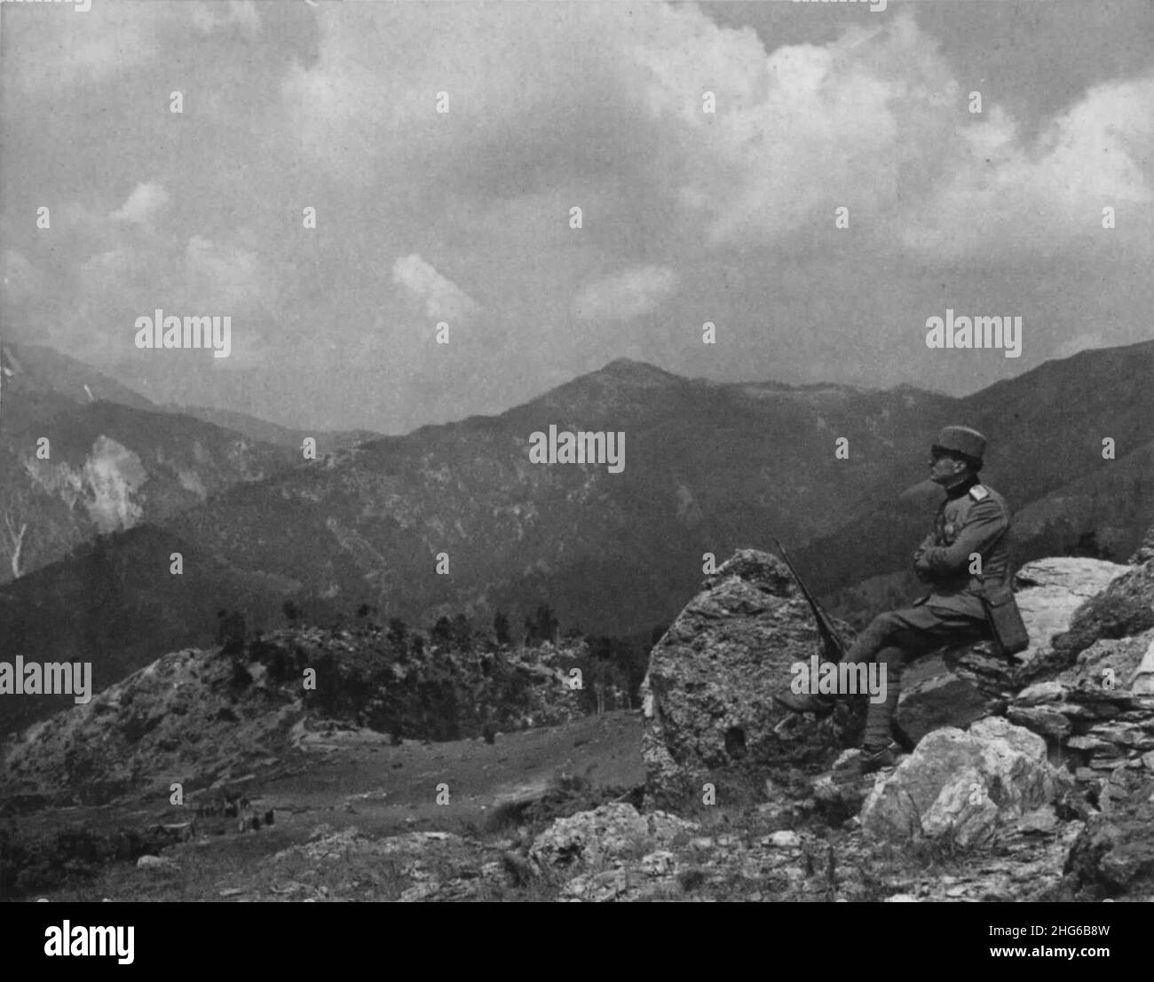 Serbian solider looking to Kaymakcalan massif from Gornji Požar (Macedonian front). Stock Photo