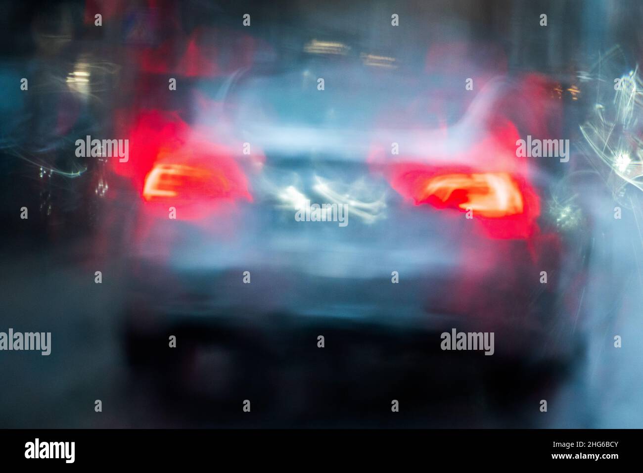 Messy traffic situations shot through rainy window Stock Photo - Alamy