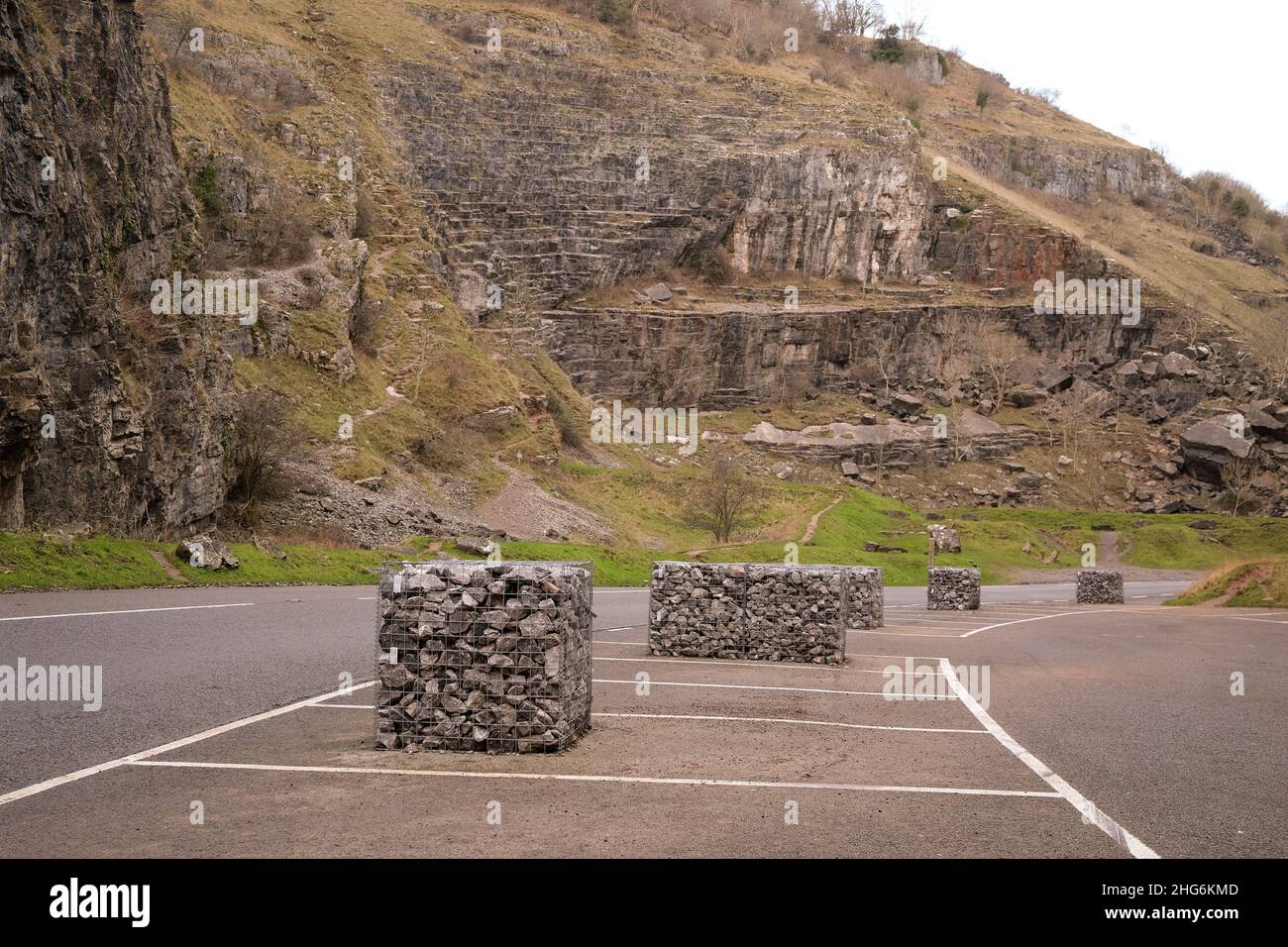 January 2022 - Gabion's placed in the car parks of gorge in Cheddar, Somerset, England, UK. to  limit the numbers of drivers with their reckless ways Stock Photo