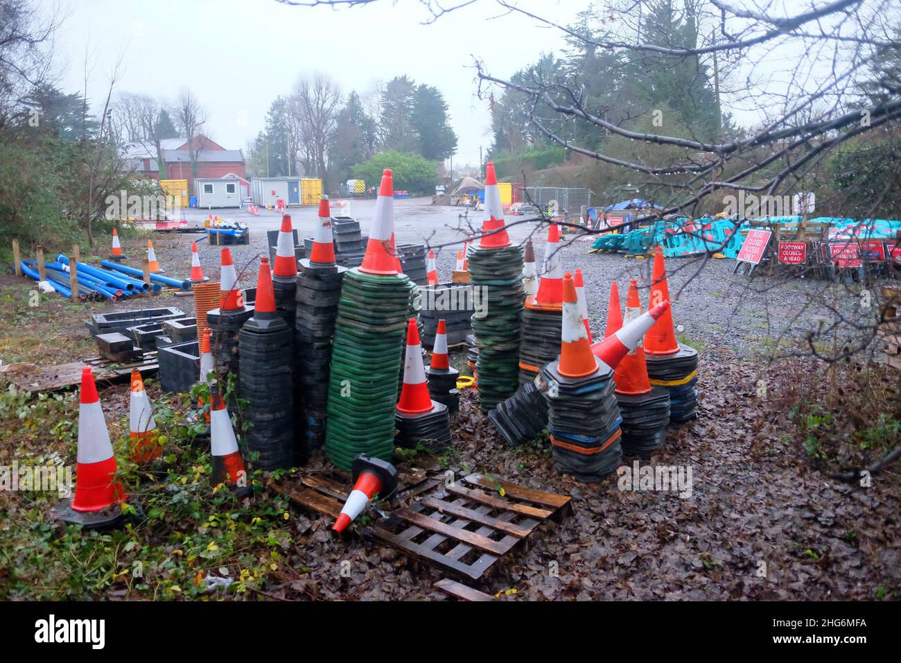 January 2022 - Road cones in a construction and plant yard in Cheddar, Somerset, England, UK. Stock Photo