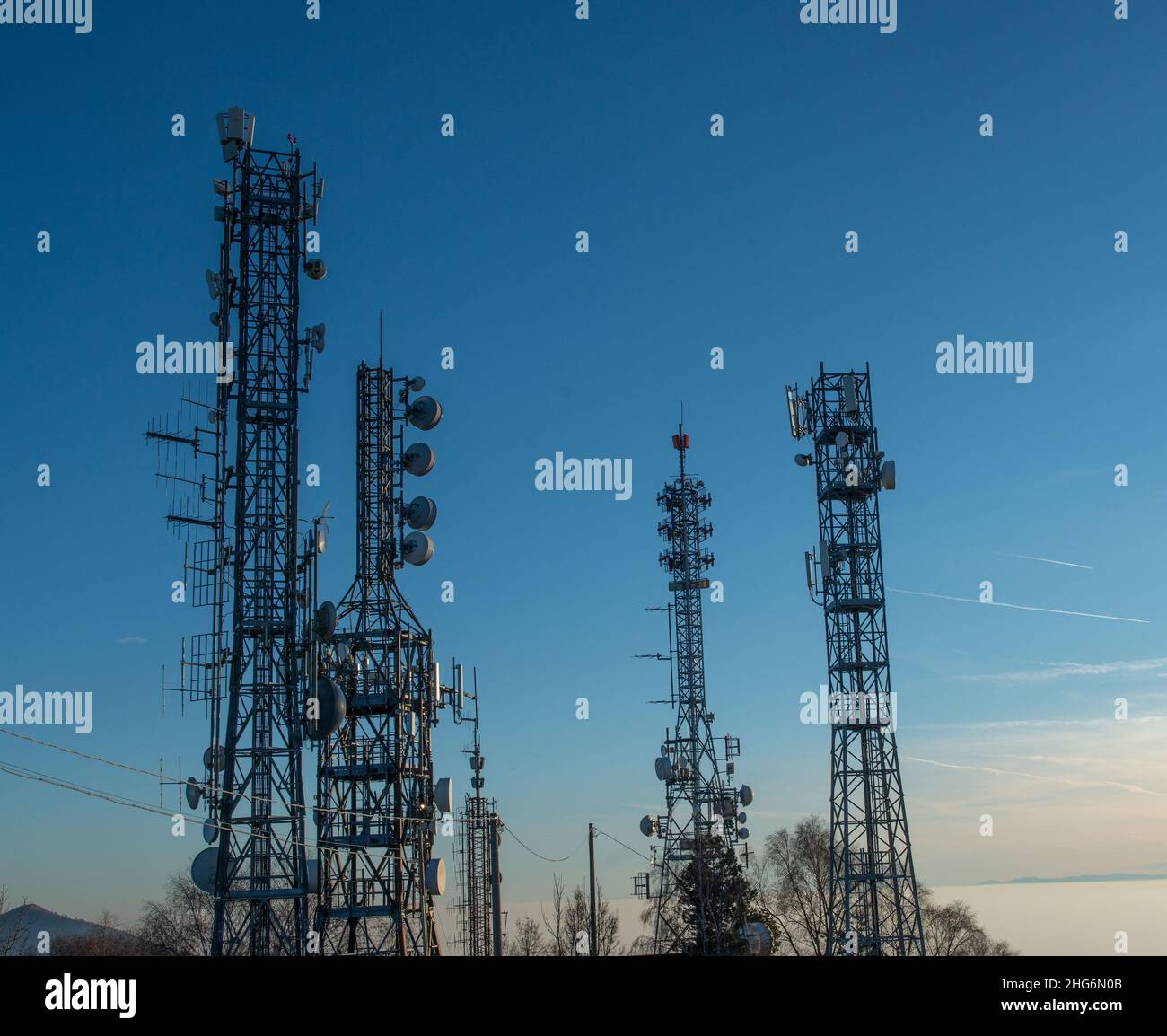 Pylons with telecommunication repeaters Stock Photo