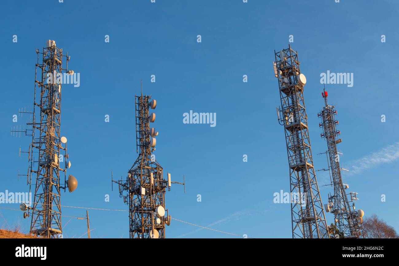 Pylons with telecommunication repeaters Stock Photo