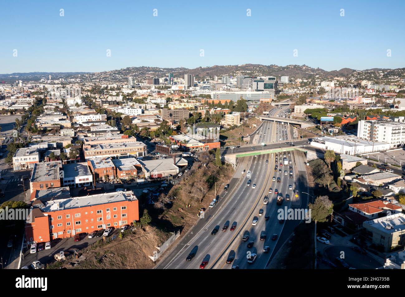 Aerial view of the 101 freeway towards Hollywood and the Santa Monica Mountains in Los Angeles Stock Photo
