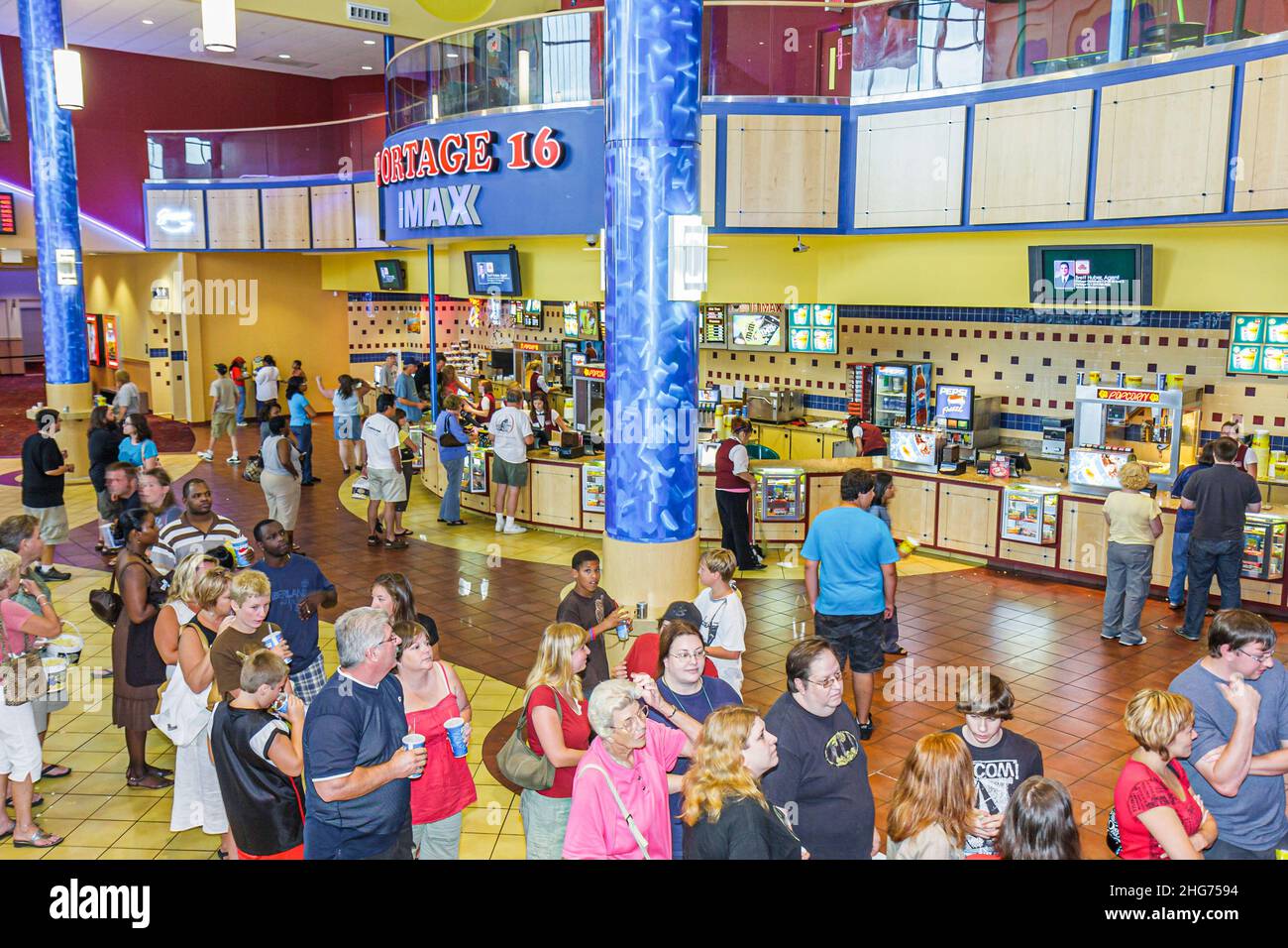 Indiana Portage 16 IMAX movie theater theatre complex lobby,ticket line overhead view food snacks family families entertainment,long line lines queue Stock Photo