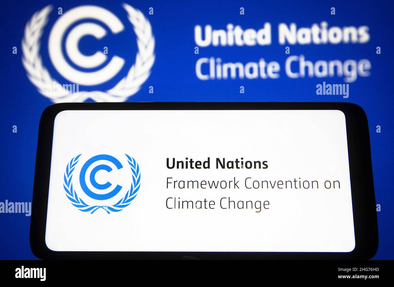 Ukraine. 18th Jan, 2022. In this photo illustration, United Nations Framework Convention on Climate Change (UNFCCC) logo is seen on a smartphone and a computer screen. (Photo by Pavlo Gonchar/SOPA Images/Sipa USA) Credit: Sipa USA/Alamy Live News Stock Photo