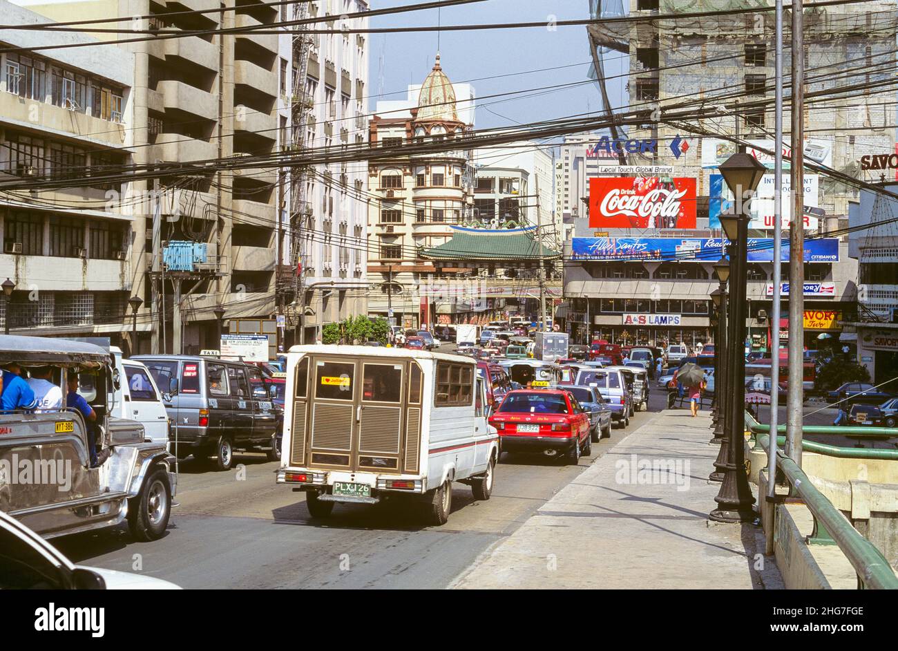 Traffic on Quintin Paredes Road on the Jones Bridge over the Pasig River in Manila, the Philippines. The bridge, officially titled the William A. Jones Memorial Bridge, links Ermita to Binondo, which is Manila's bustling and crowded Chinatown district. Pictured: traffic congestion on Quintin Paredes Road on the Jones Bridge looking towards Binondo. Stock Photo