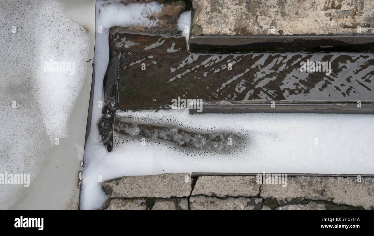 Small water channel in selective focus Stock Photo