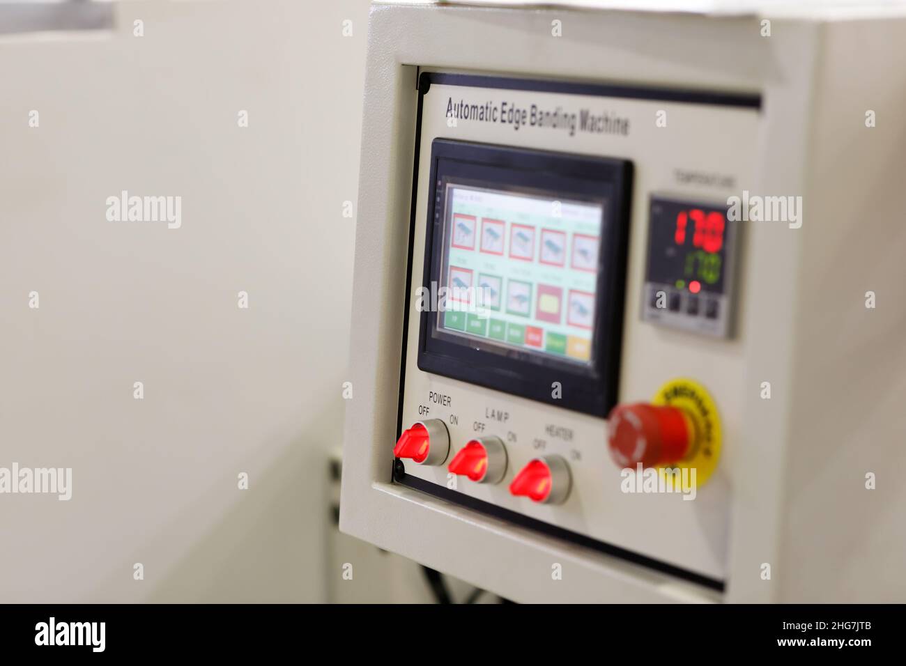 Control panel of automatic edge banding machine. Selective focus. Stock Photo