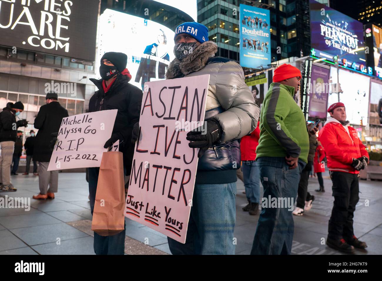 NEW YORK, NY JANUARY 18 People hold signs that read "Michelle Alyssa