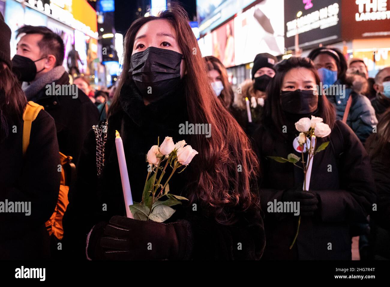 New York, USA. 12th Jan, 2022. New Yorkers attend a candlelight vigil