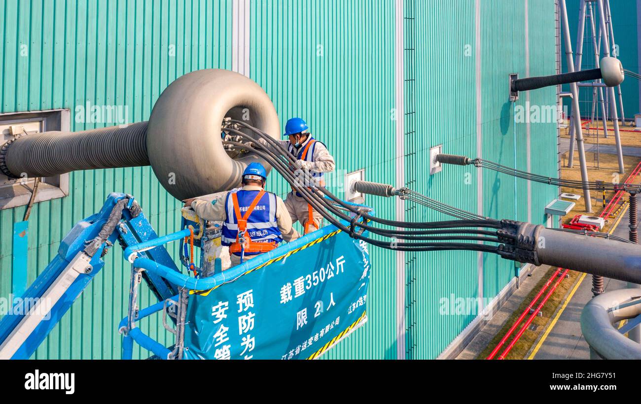 SUZHOU, CHINA JANUARY 19, 2022 Construction workers overhaul the