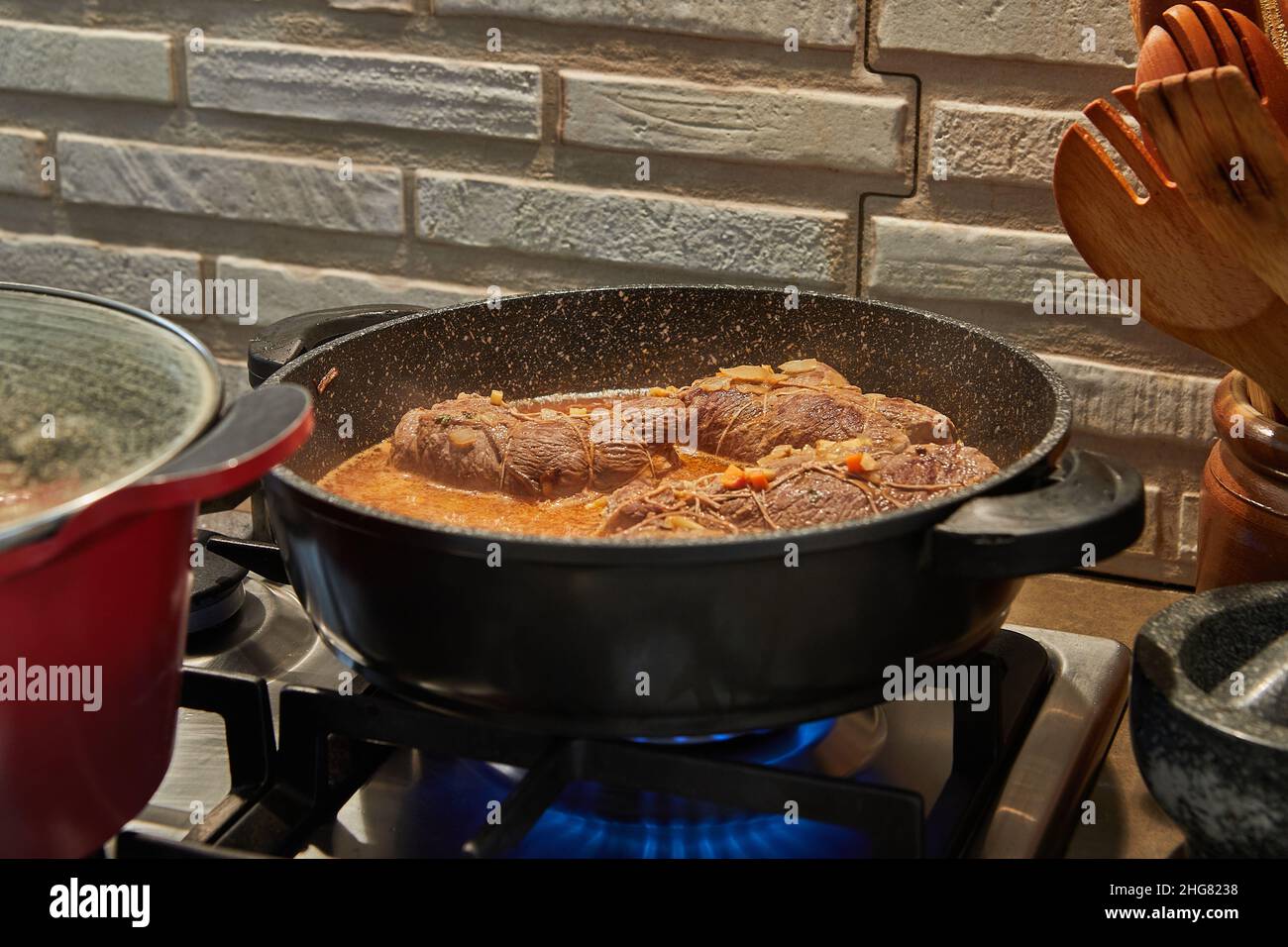 Chef fries veal in hi-res stock photography and images - Alamy